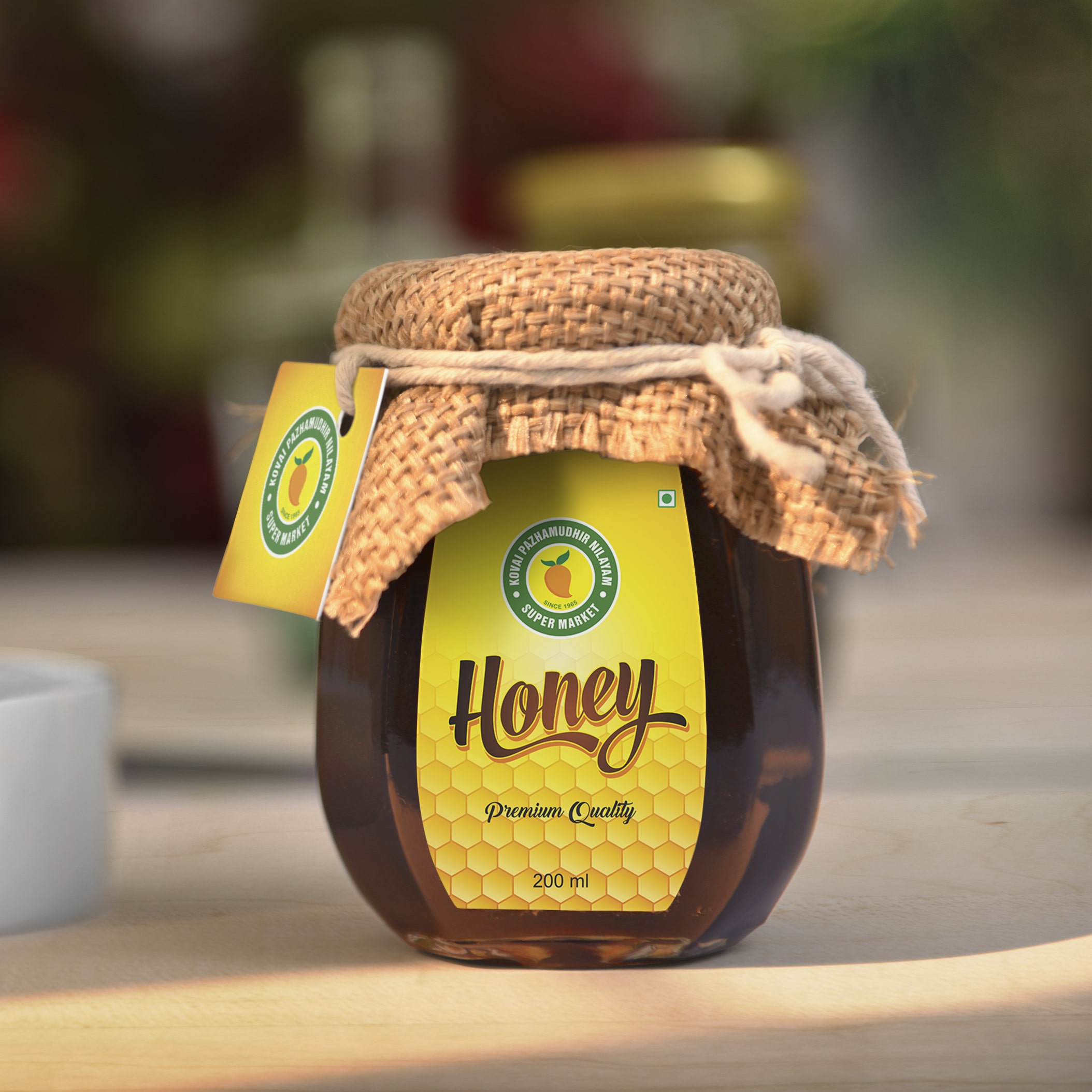 Pazhamudir-Honey-Package-Design